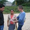 Henry and Beth sharing the gospel with a passer-by on the street.